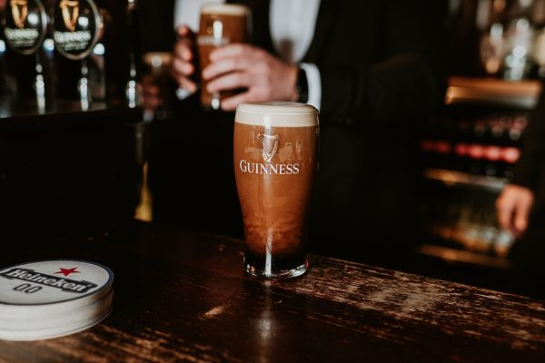 Close-up of a pint of Guinness on the bar during a wedding celebration at Johnnie Fox’s Pub.