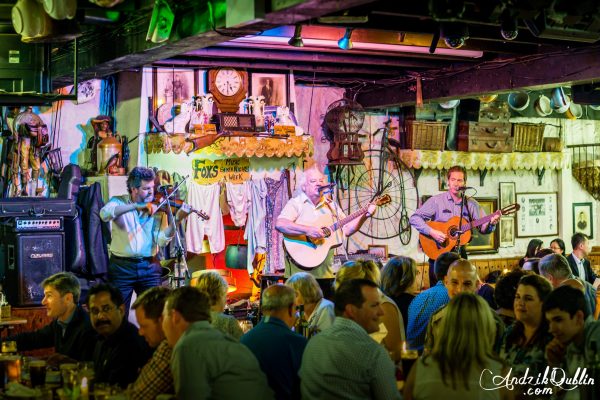 Irish band performing on stage during the Hooley Show at Johnnie Fox’s